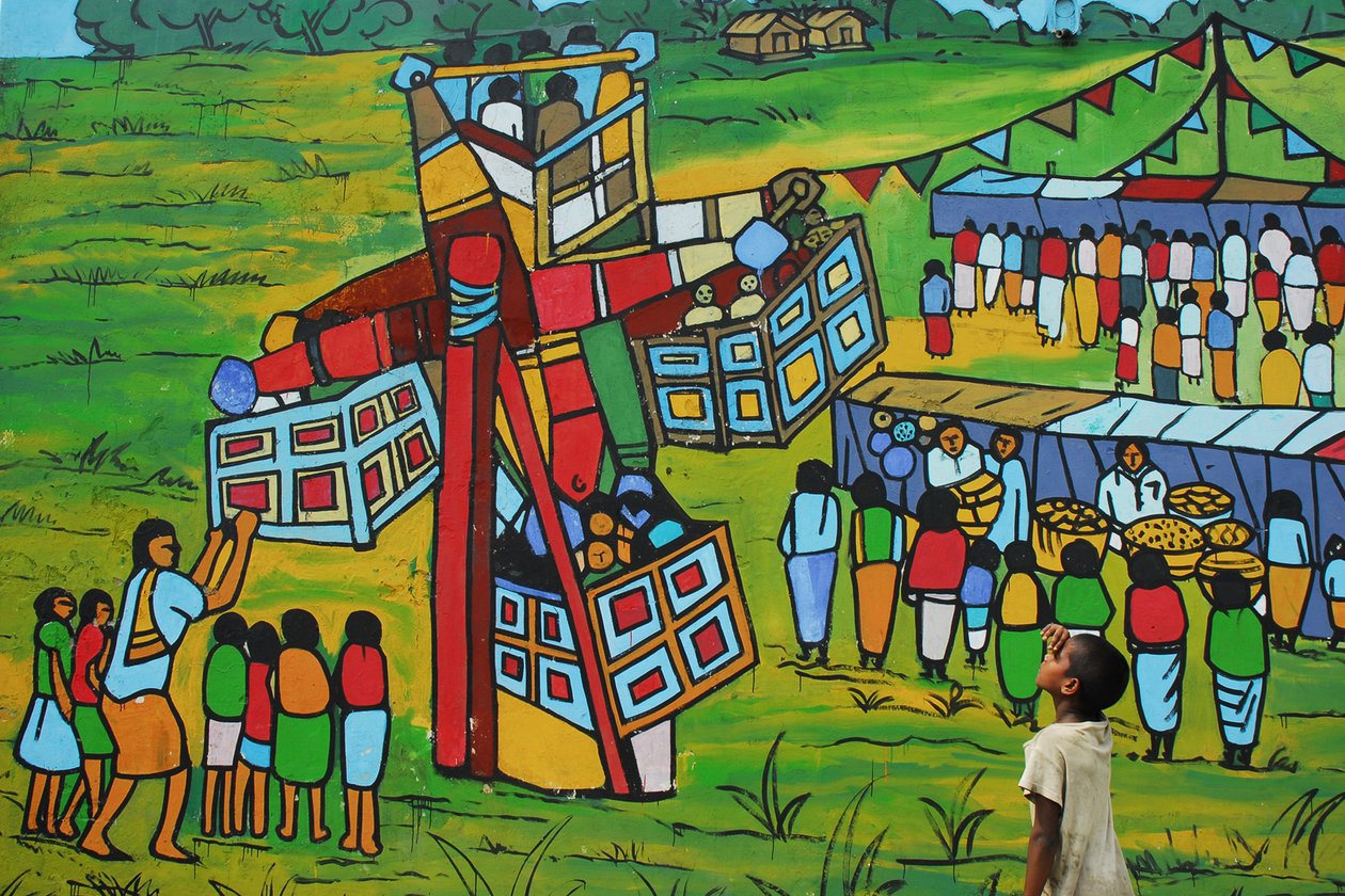 Egy gyerek falfestményt lát a Sonargaon Folk Art Institute falán, Sonargaonban (Dhaka, Banglades). 2007. március 23. alkotó: Unknown
