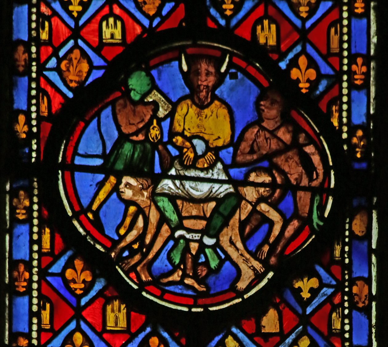 Sátánt az udvarában ábrázoló ablak alkotó: French School