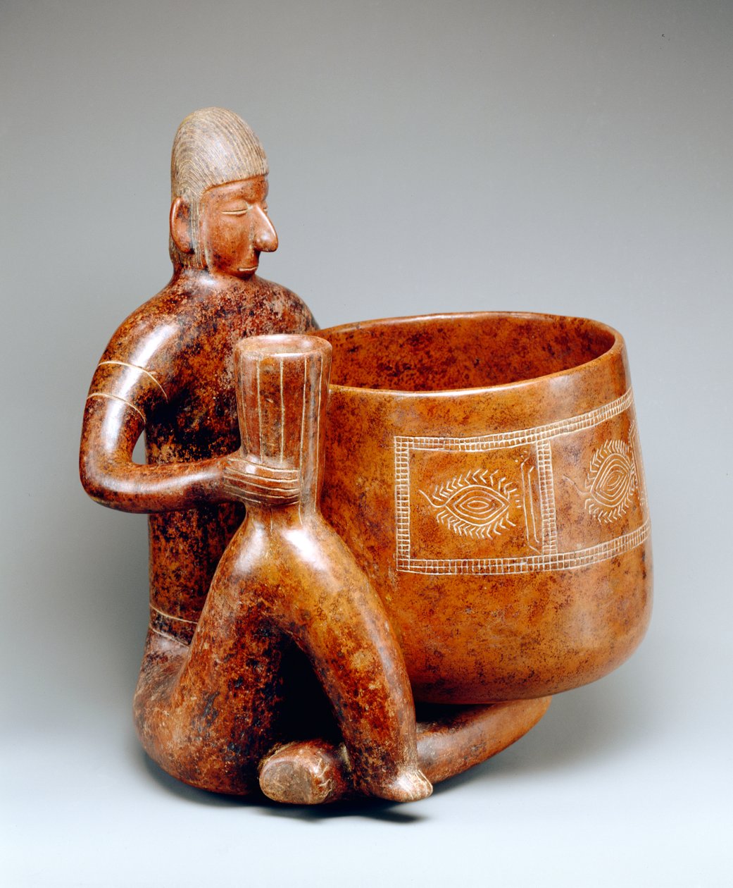Ülő férfi (cserépedény) alkotó: Colima Culture