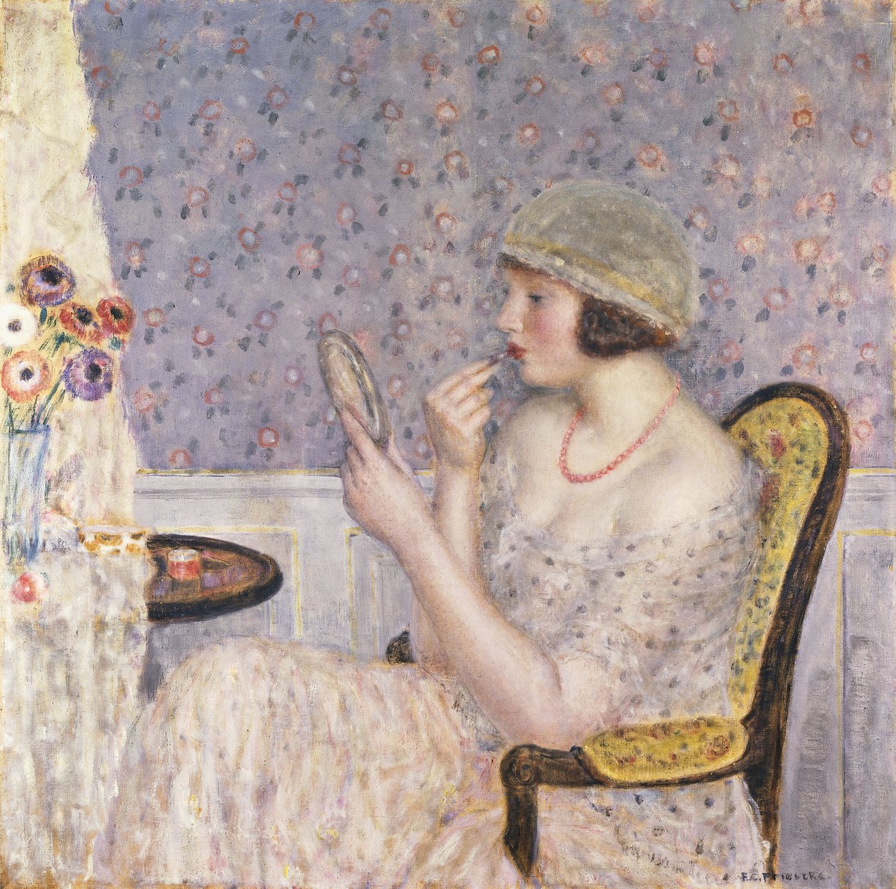 Nő egy fésülködőasztalnál alkotó: Frederick Carl Frieseke