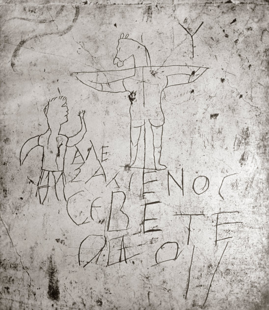 Káromló graffito egy keresztre feszítésről (kő) alkotó: Roman