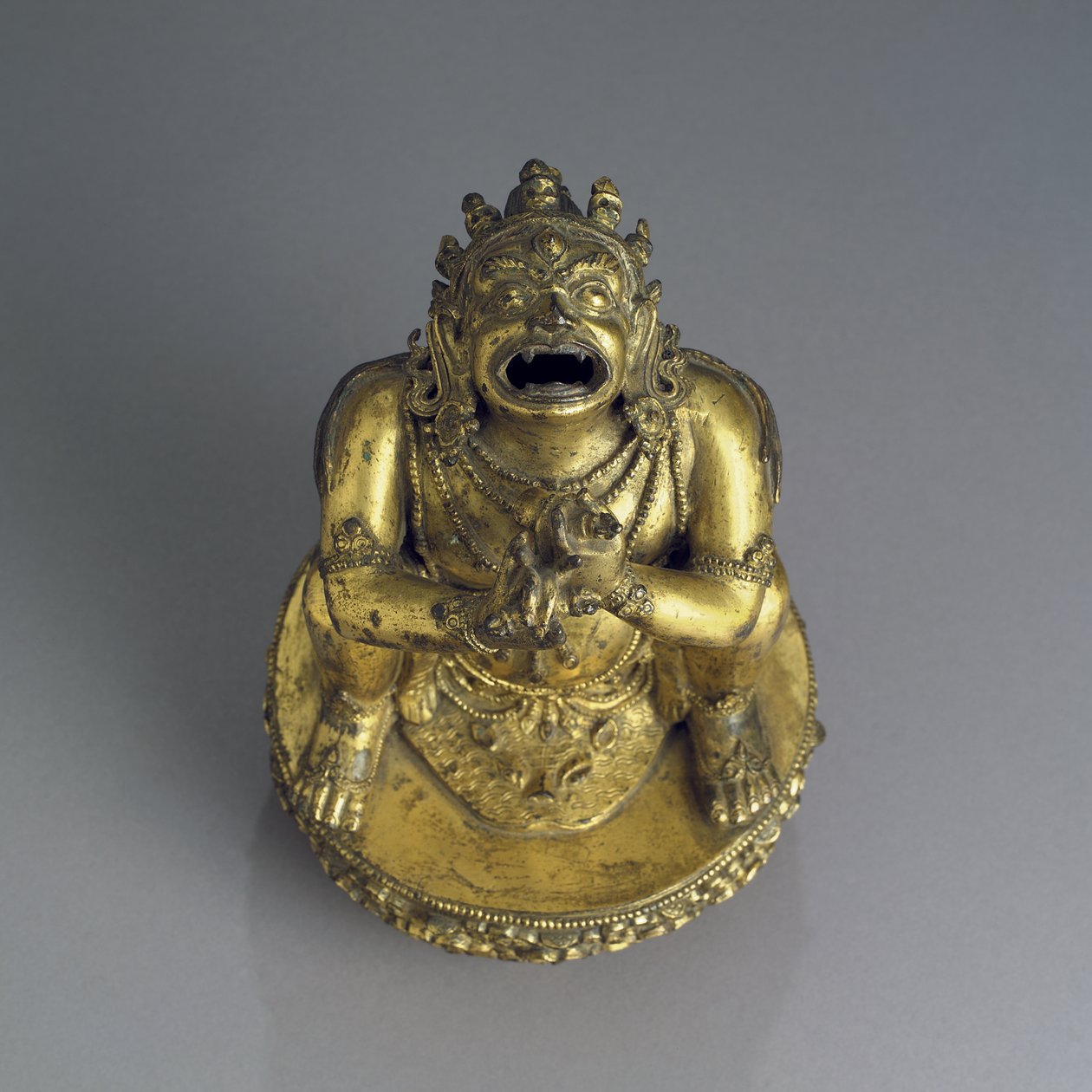 Dakát eszik (bronz) alkotó: School Tibetan