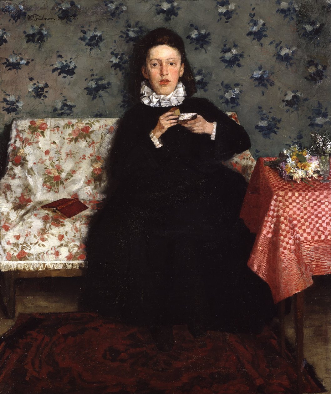 A kanapén alkotó: Wilhelm Trübner